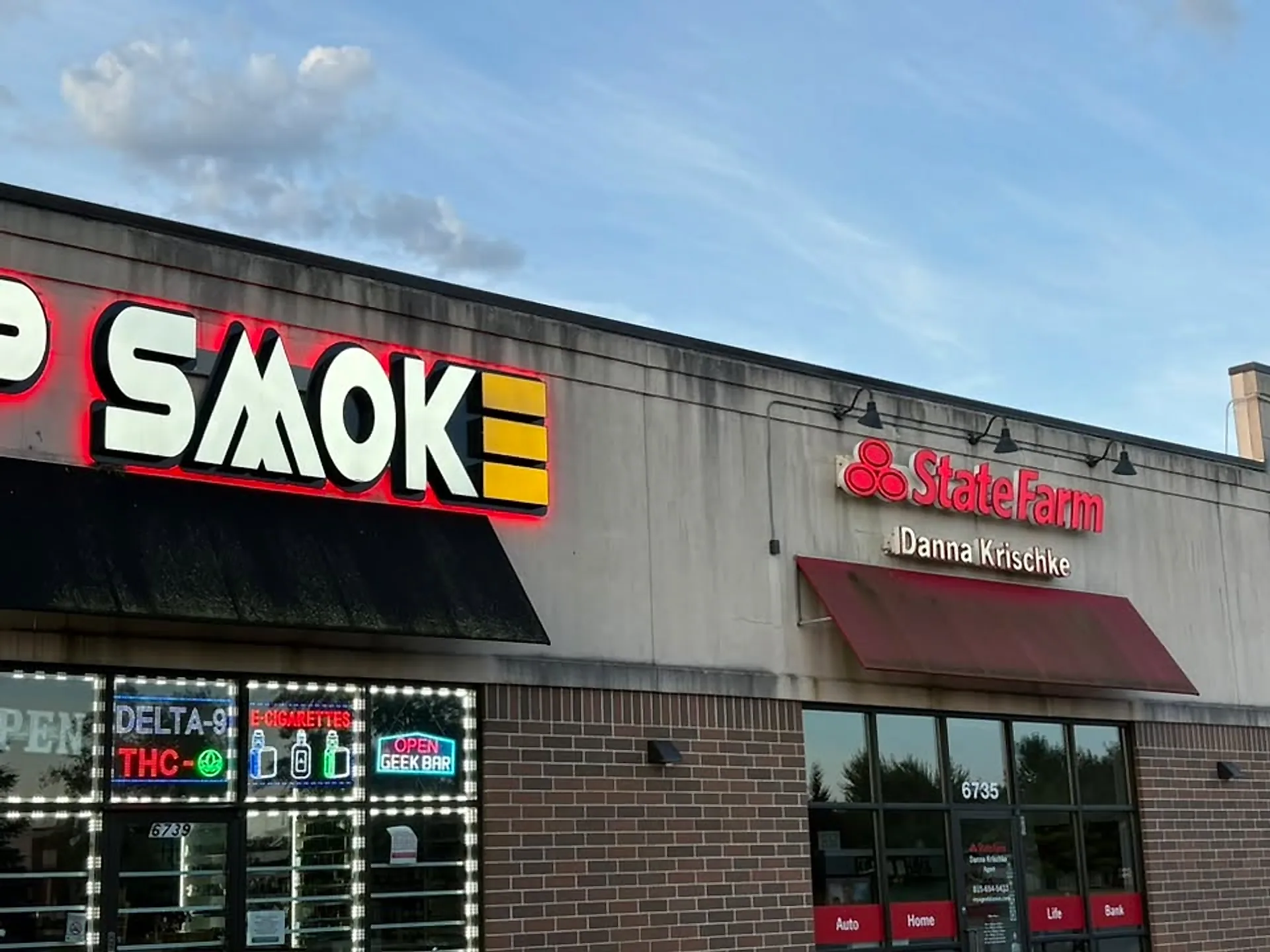 Storefront brickwork and signage washed clean at a Rockford-area strip mall