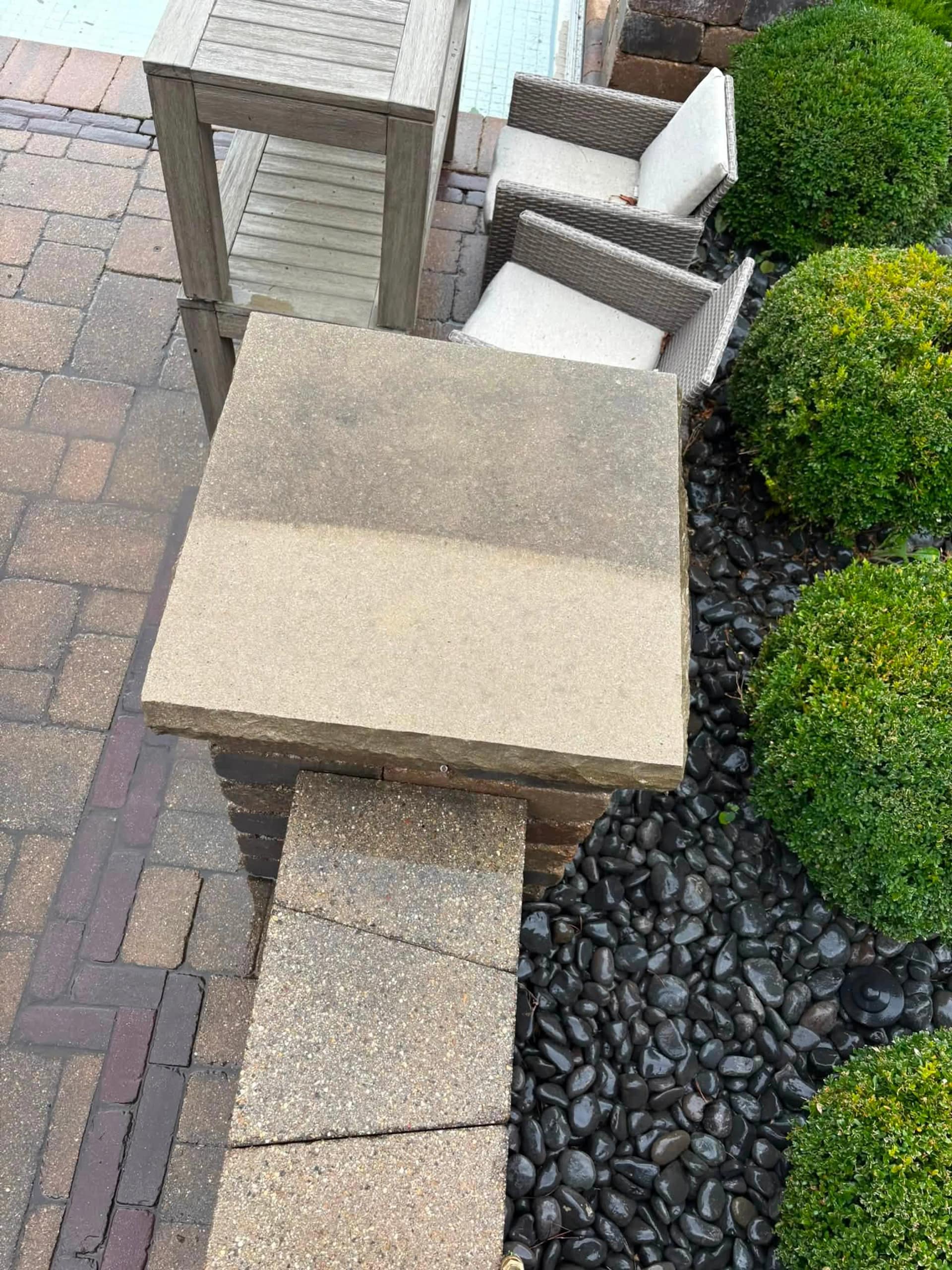 Patio furniture back in place on freshly cleaned pavers